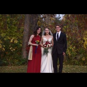 Red formal gown- floor length, spaghetti strap, backless. US size 6, worn once